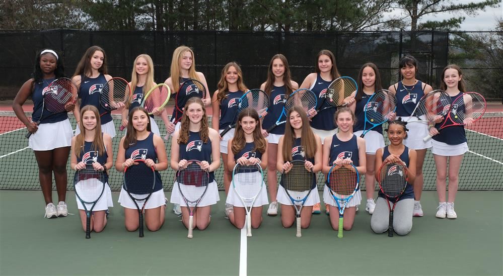 Group picture of girl's tennis team at HMS